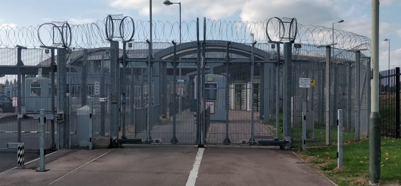 Outside the front gate of GCHQ.
